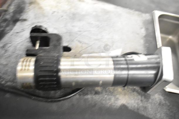 Winco Spectrum ESVI-1 Immersion Circulator, 120V, 1 Phase, in used condition, showing minor wear.