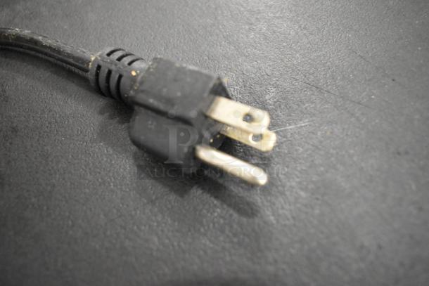 Close-up image of a black power plug belonging to the Winco Spectrum ESVI-1 Immersion Circulator. 120 Volts, 1 Phase.