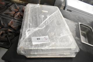 Lot of 3 poly clear lids wrapped in plastic, new condition, auction tag labeled "85 QTY 3".