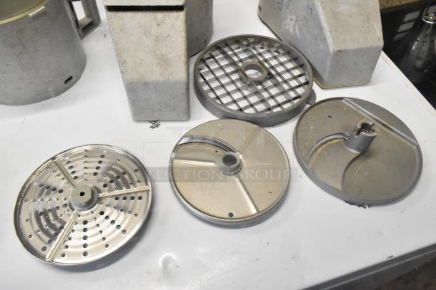11 kitchen items: continuous feed head, 2 bowls, 2 S blades, 3 slicing blades, 3 grating blades. Good condition.