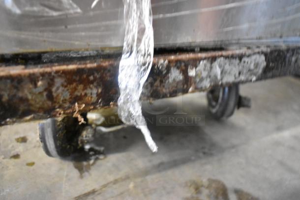 2016 Pitco Frialator 35C fryer on casters, stainless steel, natural gas, 90,000 BTU, visible rust and wear on frame.