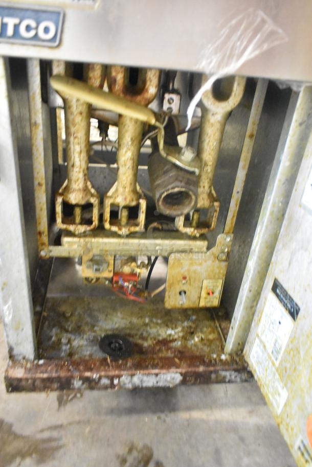 2016 Pitco Frialator 35C stainless steel deep fat fryer, 90,000 BTU, on commercial casters, visible wear, natural gas powered.