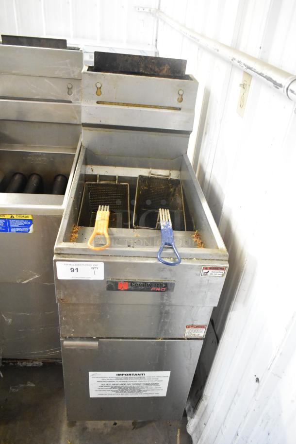 Cecilware Pro stainless steel commercial gas fryer with two metal fry baskets. Visible labels indicate model and safety instructions.