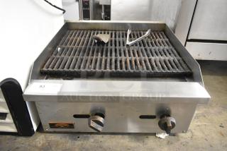 Copper Beach stainless steel commercial charbroiler grill, gas powered, features dual control knobs, moderate wear visible.