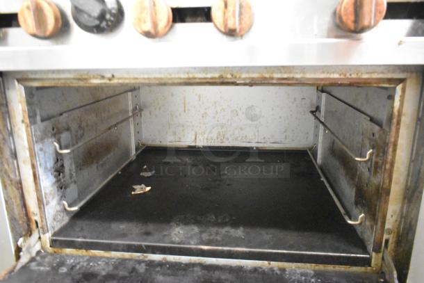 Copper Beech CBR-6 commercial gas range oven, interior view, stainless steel, 6 burners, signs of use, 211,000 BTU.