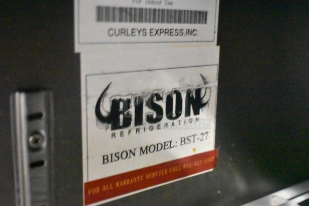 2017 Bison BST-27 stainless steel commercial cooler label, showing model and warranty contact details.