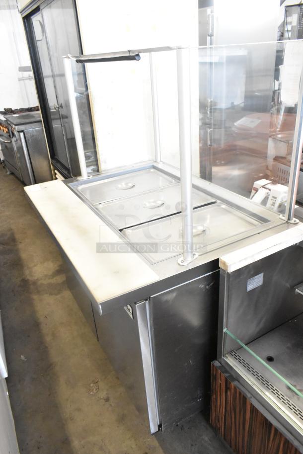 Coldline SMP48 stainless steel commercial prep table with sneeze guard and commercial casters, 115V, 1 phase, excellent condition.