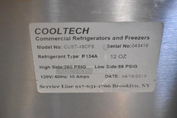 Label on the 2019 Cooltech CUST-48OFS commercial merchandiser. Shows model, serial number, refrigerant type, and voltage.
