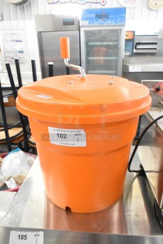Orange Poly Lettuce Spinner with hand crank and lid, minor wear, auction label "102 QTY 1".