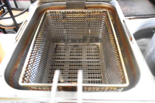 2023 Eggkitpo EGEF-12L metal countertop electric fryer with fry basket and lid, 120 volts, single bay, used condition.