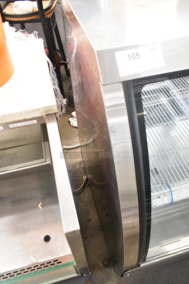 Universal FCI-48 metal commercial deli display case, 115V, 1 Phase. Floor style merchandiser in used condition.