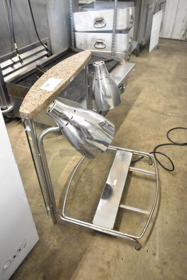 Vollrath CSV1201 metal countertop meat carving station with granite top and heat lamps. 120 volts, 1 phase.