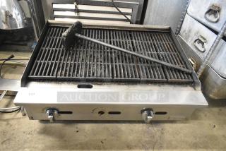 Migali stainless steel commercial countertop gas charbroiler grill, dual knobs, metal grate, used condition.