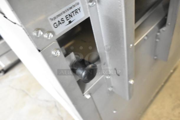 Close-up of the Mainstreet 541E36N range showing the "GAS ENTRY" label on stainless steel construction.