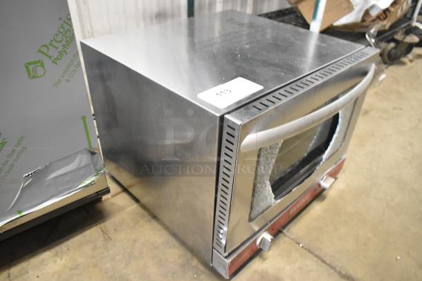 Brand new Avantco 177CO14 stainless steel countertop convection oven, 0.8 cu. ft., glass damage visible. 120 volts, 1 phase.