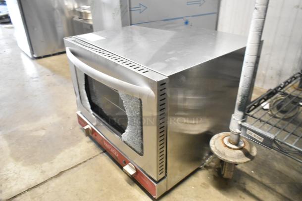 Brand new Avantco 177CO14 stainless steel countertop convection oven, 0.8 cu. ft., glass damage visible, 120V, 1 phase.