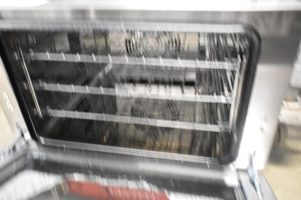 Brand new Avantco 177CO14 stainless steel countertop convection oven, 0.8 cu. ft. Slight glass damage, 120 volts, 1 phase.