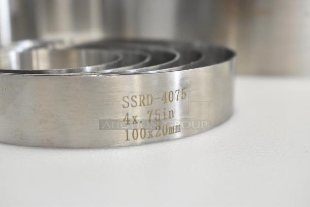 Fat Daddio's stainless steel cake ring mold, brand new, showing model SSRD-4075 with dimensions 4x.75in, 100x20mm.