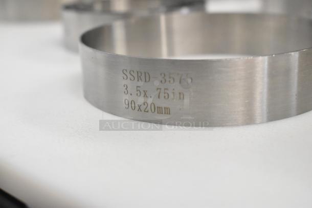 Fat Daddio's stainless steel cake ring, model SSRD-3575, 3.5x.75in, 90x20mm, new condition with minor scratches.