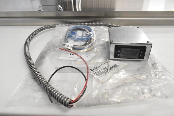 BRAND NEW Delfield 000-282-00HB-S Assy2194763Boxctlkit4400 in original packaging; includes control display and coiled cable.