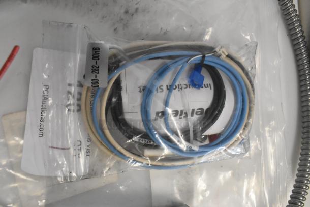 Brand new Delfield 000-282-00HB-S kit in original packaging; includes wires and connectors, slight cosmetic wear visible.