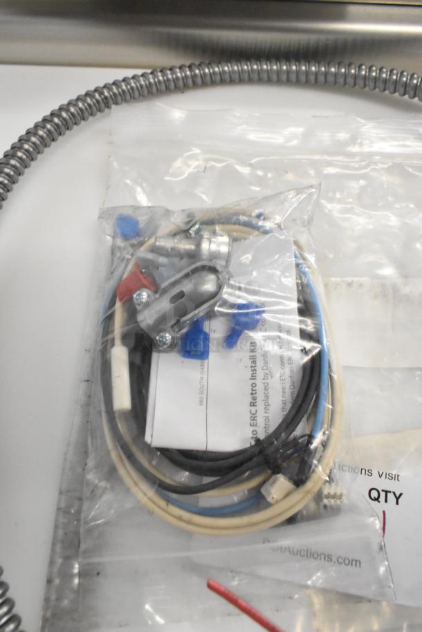 Brand new Delfield 000-282-00HB-S Assy2194763Boxctlkit4400 in sealed packaging; includes wiring and connectors.
