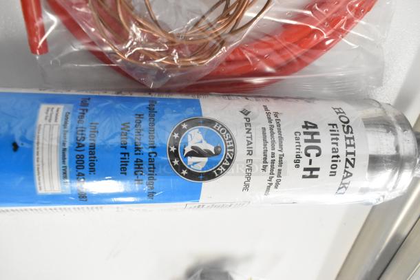 Hoshizaki 4HC-H water filter cartridge, brand new, with markings indicating Pentair Everpure compatibility. Includes Catchall C-032 filter drier.
