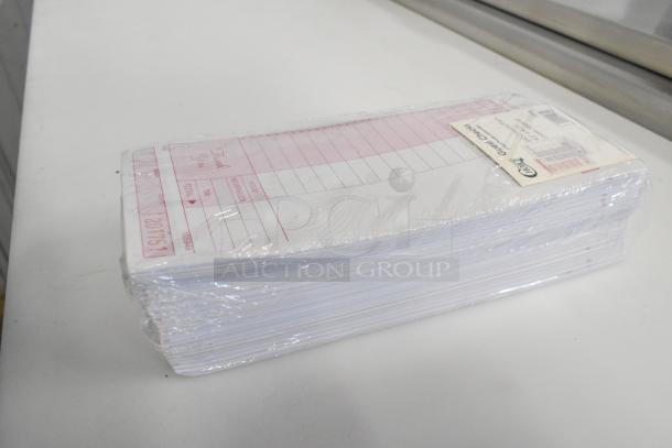 New Choice 999948 guest checks bundle, wrapped, minor scratches. Contains item numbers, ideal for dining services.