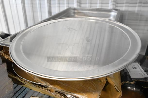 Two new items: Vollrath 30025 stainless steel transport pan, full size, 2.5" deep, and American Metalcraft TP14, 14" pizza pan.
