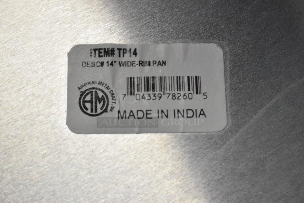 American Metalcraft TP14 14" wide rim pizza pan label, item #TP14, "Made in India", barcode and AM logo visible.
