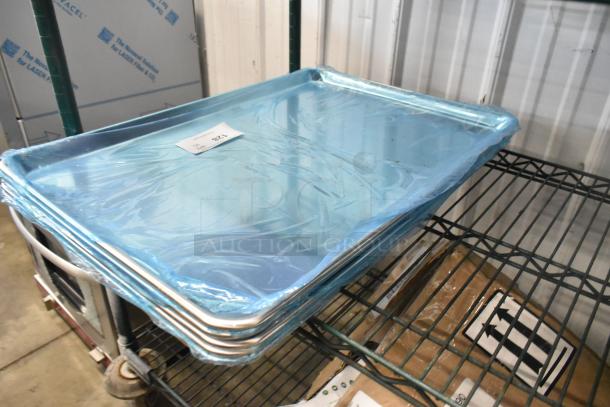 5 new Choice 407BUNFULL full-size 18"x26" 19 gauge aluminum bun pans, wire rim, scratch and dent condition.