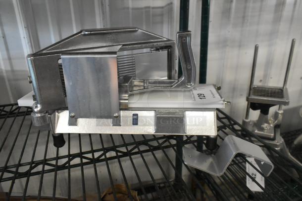 Brand new Choice 4071875TS 3/16" tomato slicer, scratch and dent condition; NSF certified, sturdy metal construction.