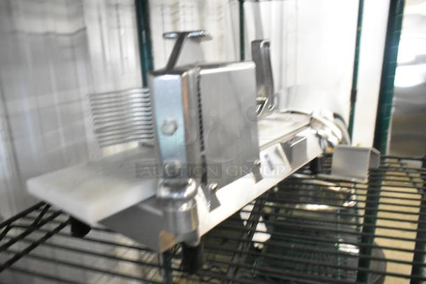 Brand new Choice 4071875TS 3/16" tomato slicer with minor scratches. Durable metal construction for food prep.