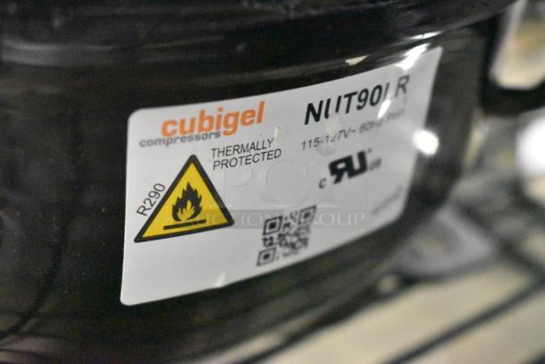 Cubigel NUT90LR Compressor, thermally protected, 115-127V, 1 phase. R290 label visible. Brand new, scratch and dent condition.