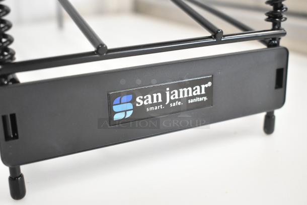 Brand new San Jamar 102110 black rack, Choice make, slight scratch and dent. Logo reads "smart. safe. sanitary."