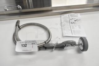 Brand new Choice T&S spray nozzle, scratch and dent condition. Includes flexible hose, installation instructions visible.