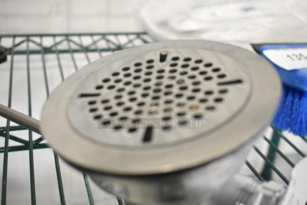 Brand new Choice T&S metal drain, scratch and dent; durable design with circular perforated cover.