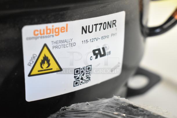BRAND NEW Cubigel NUT70NR Compressor, 115-127V, 1 Phase, thermally protected, R290 refrigerant warning label.