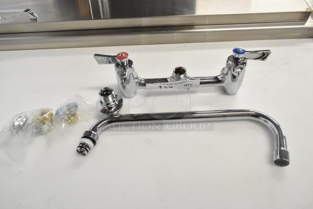 Brand new Choice faucet set, chrome finish, scratch and dent, with hot and cold handles, installation parts included.