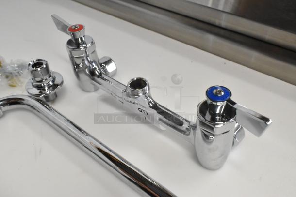 Brand new Choice faucet with handles, scratch and dent condition, chrome finish, includes installation hardware.