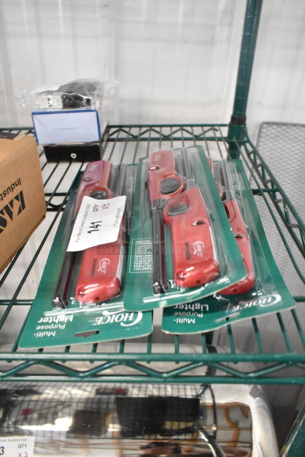 Three sets of new Choice multi-purpose lighters, two per set, in original packaging with minor scratches.