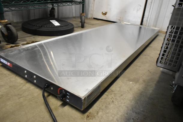 Brand new ServIt 423HSW2060 60" stainless steel heated shelf warmer, 120 Volts, 1 Phase, with minor scratches.