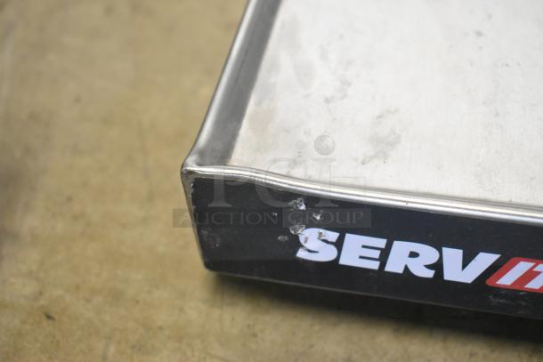 Brand new ServIt 423HSW2060 heated shelf warmer, 60" stainless steel, visible scratches and dents, 120V, 1 phase.