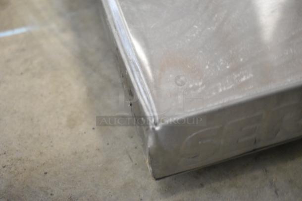 Brand new ServIt 423HSW2060 heated shelf warmer, 60" stainless steel, minor scratches, 120V, 1 Phase, embossed branding.
