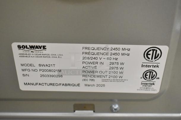 BRAND NEW Solwave SWA21T stainless steel commercial microwave, 208/240V, push button controls, ETL certified, model label shown.