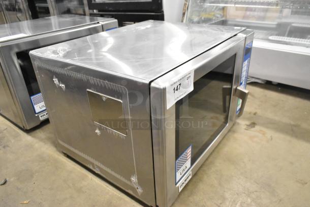 Brand new Solwave SWA21T commercial microwave, stainless steel, medium-duty, with visible scratch and dent, 208/240V, 1 phase.