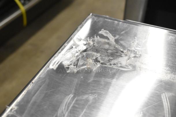 BRAND NEW SCRATCH AND DENT! 2025 Solwave SWA21T microwave; visible scratches and dents on stainless steel surface.