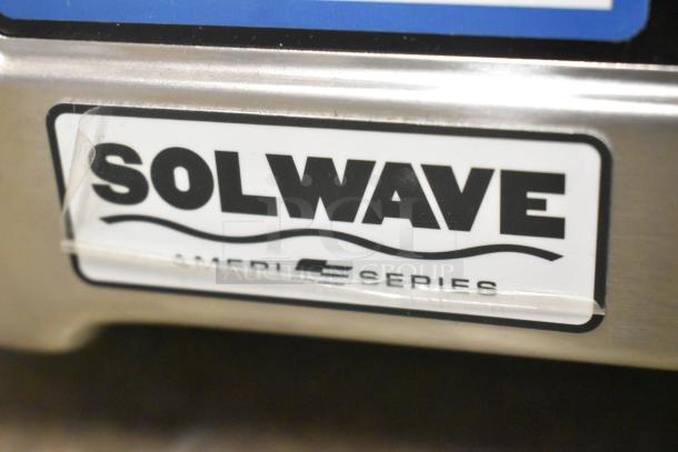 Brand new Solwave SWA21T Ameri-Series microwave; stainless steel, scratch and dent condition, push button controls.