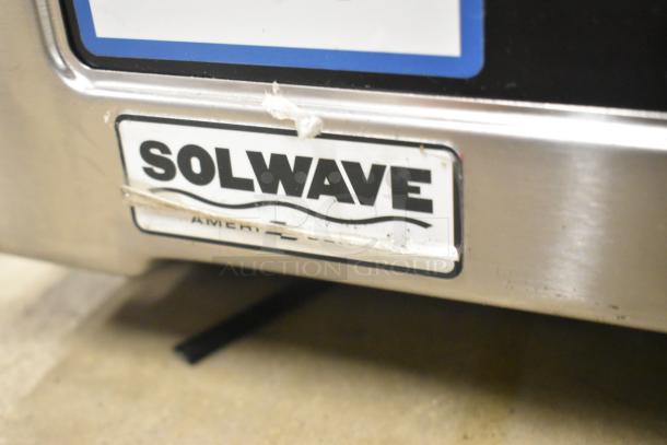 BRAND NEW SCRATCH AND DENT 2025 Solwave SWA21T stainless steel commercial microwave with push button controls.