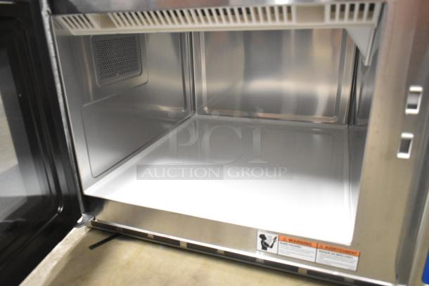 Brand new Solwave SWA21T commercial microwave, stainless steel interior, model SWA21T for 208/240 volts, 1 phase.